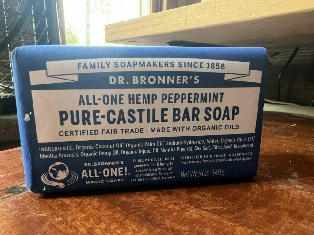 Bar of soap wrapped in blue and white packaging. Dr. Bronner's All-One Hemp Peppermint Pure-Castile Bar Soap