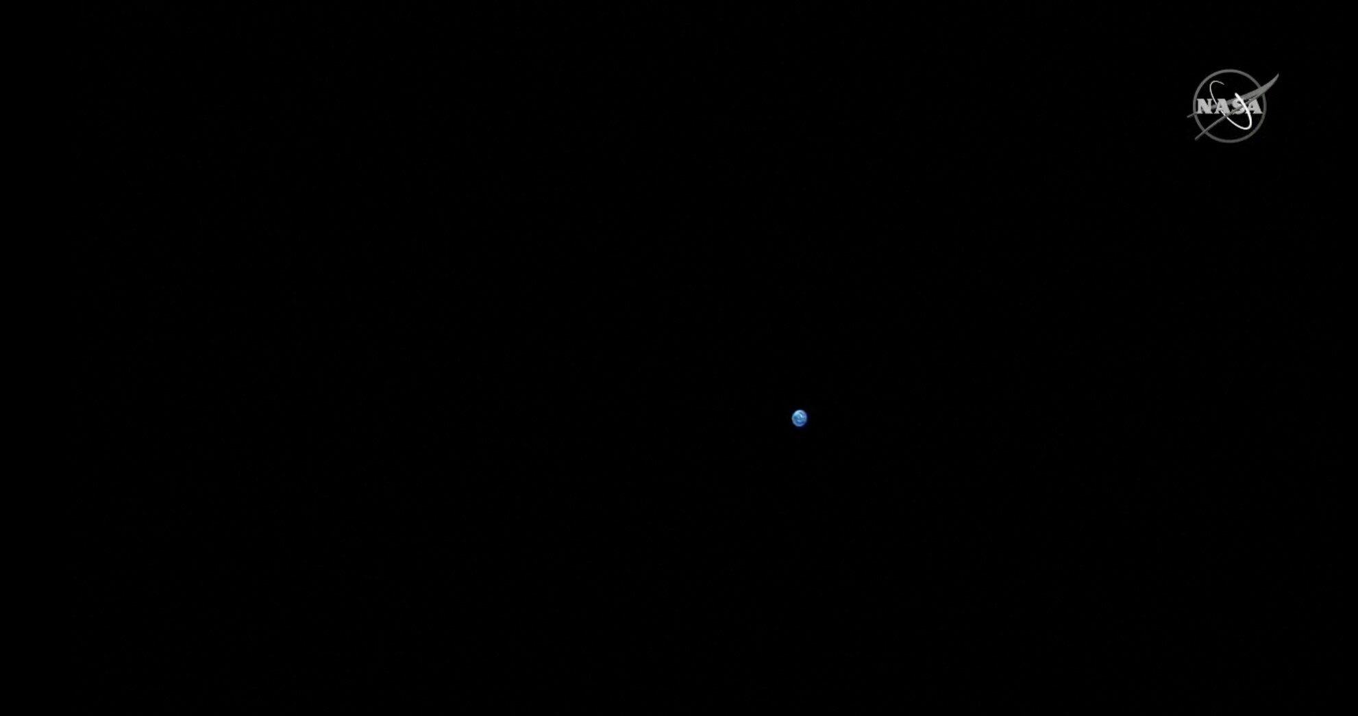 A small blue dot in the vastness of space. The Earth as seen from Orion in it's orbit of the moon Monday, November 21, 2022